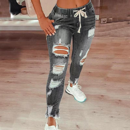 Jean taille haute déchiré à cordon élastique pour femme