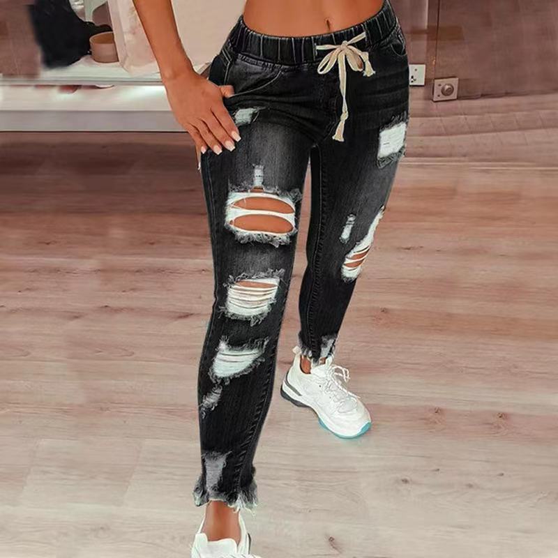 Jean taille haute déchiré à cordon élastique pour femme