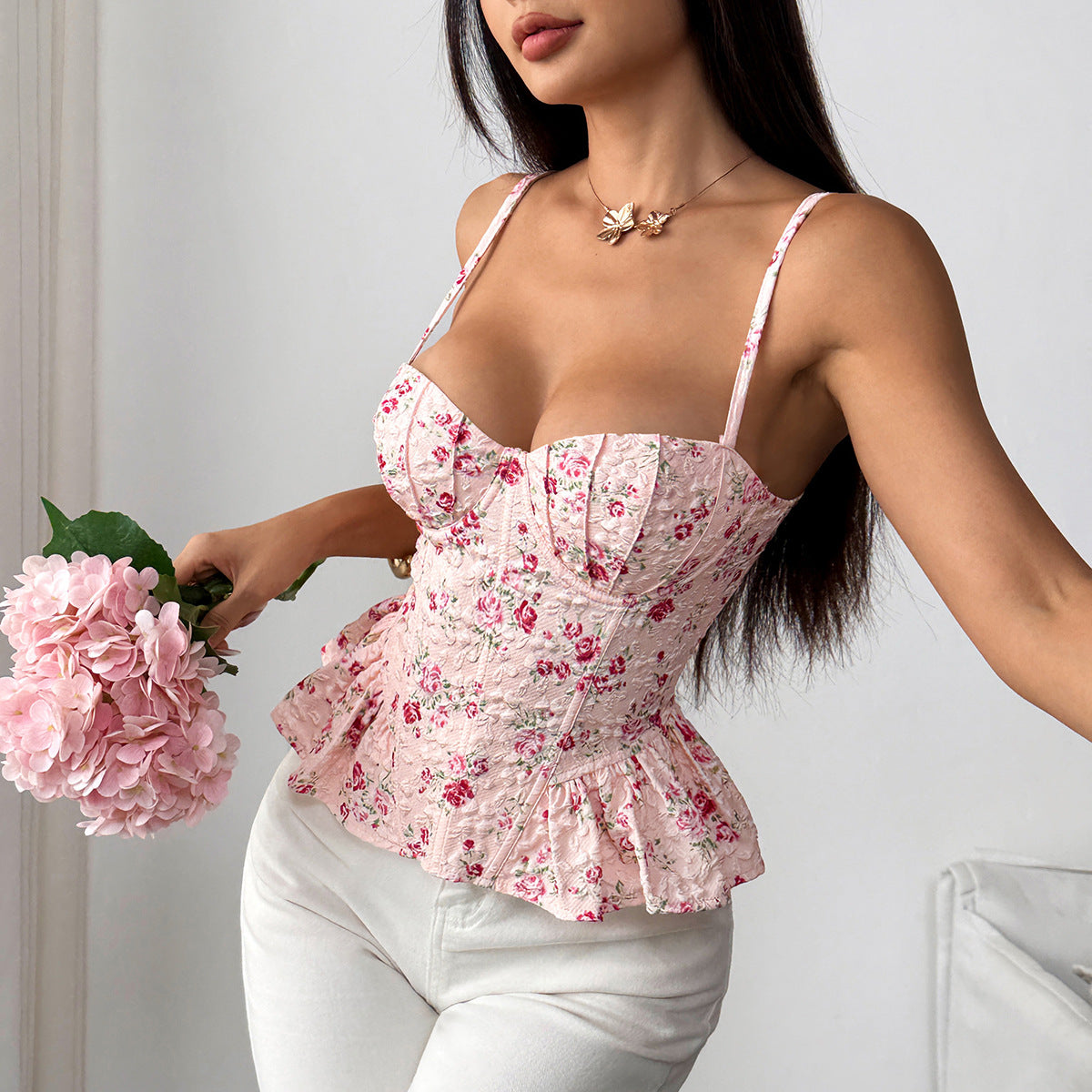 Haut asymétrique à volants imprimé floral